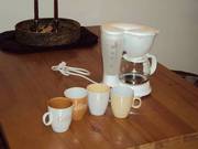 4-cup coffee maker and mugs
